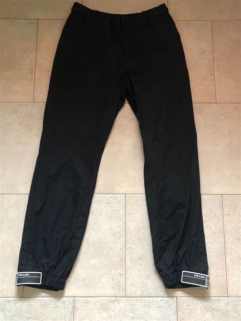 prada 018 track pants|Prada black tracksuit.